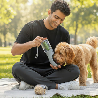 FURRYKU 3-in-1 portable dog water bottle and food container, grey and clear BPA-free plastic, with integrated trough and waste bag dispenser.