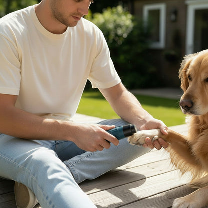 FURRYKU teal dog nail grinder with LED light and diamond bit, used by a person on a golden retriever's paw.