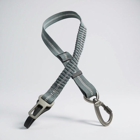 FURRYKU grey adjustable retractable dog car seat belt with elastic shock-absorption and zinc alloy clip.